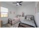 Bedroom with two twin beds and shared dresser at 2408 N Morrison Ave, Casa Grande, AZ 85122