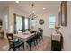 Spacious dining room with large table and chandelier at 2408 N Morrison Ave, Casa Grande, AZ 85122