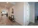 Bright entry hallway with wood-look floors and bench at 2408 N Morrison Ave, Casa Grande, AZ 85122