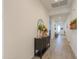 Long hallway with console table and mirror at 2408 N Morrison Ave, Casa Grande, AZ 85122