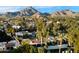 Aerial view of a neighborhood with mountain views and many houses at 2423 E Marshall Ave, Phoenix, AZ 85016