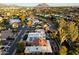 Aerial view of a luxury home in a residential neighborhood, showcasing the property and surroundings at 2423 E Marshall Ave, Phoenix, AZ 85016