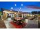 Evening view of backyard patio and water feature at 2423 E Marshall Ave, Phoenix, AZ 85016