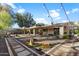 Expansive backyard with stone pathway and lighting at 2423 E Marshall Ave, Phoenix, AZ 85016