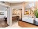 Elegant bathroom with single sink vanity and view of bedroom at 2423 E Marshall Ave, Phoenix, AZ 85016