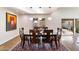 Elegant dining room with dark wood table and chairs at 2423 E Marshall Ave, Phoenix, AZ 85016