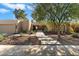 Single-story home with a tile roof, nicely landscaped front yard, and a walkway at 2423 E Marshall Ave, Phoenix, AZ 85016