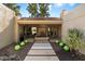 Inviting entryway with stone fountain, pathway, and landscaping at 2423 E Marshall Ave, Phoenix, AZ 85016