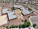 Aerial view showing the school's layout, basketball courts, and outdoor spaces in the neighborhood at 25969 W Tina Ln, Buckeye, AZ 85396