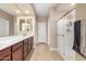 Bathroom features double vanity and a separate shower at 25969 W Tina Ln, Buckeye, AZ 85396