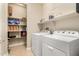 Convenient laundry room with washer, dryer and storage at 25969 W Tina Ln, Buckeye, AZ 85396