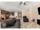 Open living area with a view of the kitchen and dining area at 25969 W Tina Ln, Buckeye, AZ 85396