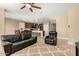 Open living area with a view into the kitchen and dining area at 25969 W Tina Ln, Buckeye, AZ 85396