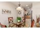 Bright dining area with glass table and four chairs, near kitchen at 26541 W Ross Ave, Buckeye, AZ 85396