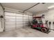 Garage with golf cart and additional storage at 26541 W Ross Ave, Buckeye, AZ 85396