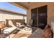 Relaxing covered patio with seating and a view at 26541 W Ross Ave, Buckeye, AZ 85396