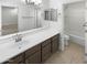 Bathroom with vanity, tub, and shower at 2708 N Heritage St, Buckeye, AZ 85396