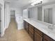 Bathroom with double vanity and soaking tub at 2708 N Heritage St, Buckeye, AZ 85396