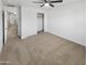 Spacious bedroom with ceiling fan and large closet at 2708 N Heritage St, Buckeye, AZ 85396
