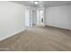 Large bedroom with plush carpeting and access to hallway bath at 2708 N Heritage St, Buckeye, AZ 85396
