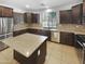 Kitchen with island and stainless steel appliances at 2708 N Heritage St, Buckeye, AZ 85396