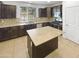 Kitchen with large island and granite countertops at 2708 N Heritage St, Buckeye, AZ 85396