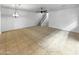 Open living area with stairs leading upstairs at 2708 N Heritage St, Buckeye, AZ 85396