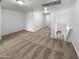 Upstairs hallway with carpet and access to bedrooms and stairs at 2708 N Heritage St, Buckeye, AZ 85396