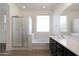 Bathroom with soaking tub and walk-in shower at 27194 N Skipping Rock Rd, Peoria, AZ 85383