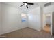 Light and airy bedroom with closet and access to hallway at 27194 N Skipping Rock Rd, Peoria, AZ 85383