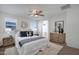 Main bedroom with dresser and ceiling fan at 27194 N Skipping Rock Rd, Peoria, AZ 85383