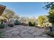 Landscaped backyard with flagstone patio at 30994 N 74Th Way, Scottsdale, AZ 85266