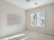 Well-lit bedroom with window shutters and neutral wall color at 30994 N 74Th Way, Scottsdale, AZ 85266