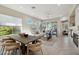 Dining area with wood table and seating near living room at 30994 N 74Th Way, Scottsdale, AZ 85266