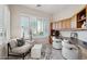 Bright home office with built-in desk and cabinets at 30994 N 74Th Way, Scottsdale, AZ 85266