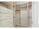 Large walk-in closet with ample shelving and hanging space at 30994 N 74Th Way, Scottsdale, AZ 85266