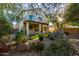 Landscaped backyard with a patio and second story balcony at 3496 E Anika Ct, Gilbert, AZ 85298