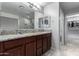 Bathroom boasts double sinks, granite counters, and a walk-in shower at 3496 E Anika Ct, Gilbert, AZ 85298