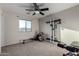 Home gym with weight rack, bench, and rowing machine at 3496 E Anika Ct, Gilbert, AZ 85298