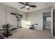 Home gym with weight rack, bench, and dumbbell set at 3496 E Anika Ct, Gilbert, AZ 85298