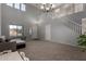 Two story foyer with gray walls, and a gray couch at 3496 E Anika Ct, Gilbert, AZ 85298