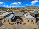 Aerial view of a large property with a main house and outbuildings at 37209 N 12Th St, Phoenix, AZ 85086