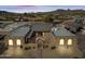 Aerial view of a sprawling ranch-style home with mountain views at 37209 N 12Th St, Phoenix, AZ 85086