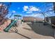 Spacious backyard with playground set and metal storage shed at 37209 N 12Th St, Phoenix, AZ 85086