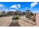 Large backyard with playground, grassy area, and covered patio at 37209 N 12Th St, Phoenix, AZ 85086