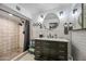 Modern bathroom with marble vanity, subway tile shower, and updated fixtures at 37209 N 12Th St, Phoenix, AZ 85086