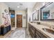 Spa-like bathroom with double vanity and large mirror at 37209 N 12Th St, Phoenix, AZ 85086