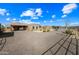 Single-story home with large gravel driveway and covered parking at 37209 N 12Th St, Phoenix, AZ 85086