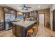 Spacious kitchen with granite countertops and dark wood cabinets at 37209 N 12Th St, Phoenix, AZ 85086