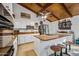 Modern kitchen with white cabinets, an island, and a contemporary design at 37209 N 12Th St, Phoenix, AZ 85086